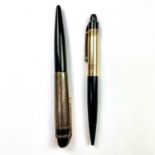 A pair of Eversharp 'Skyline' pens, one is a fountain pen with 14k nib, the other a propelling
