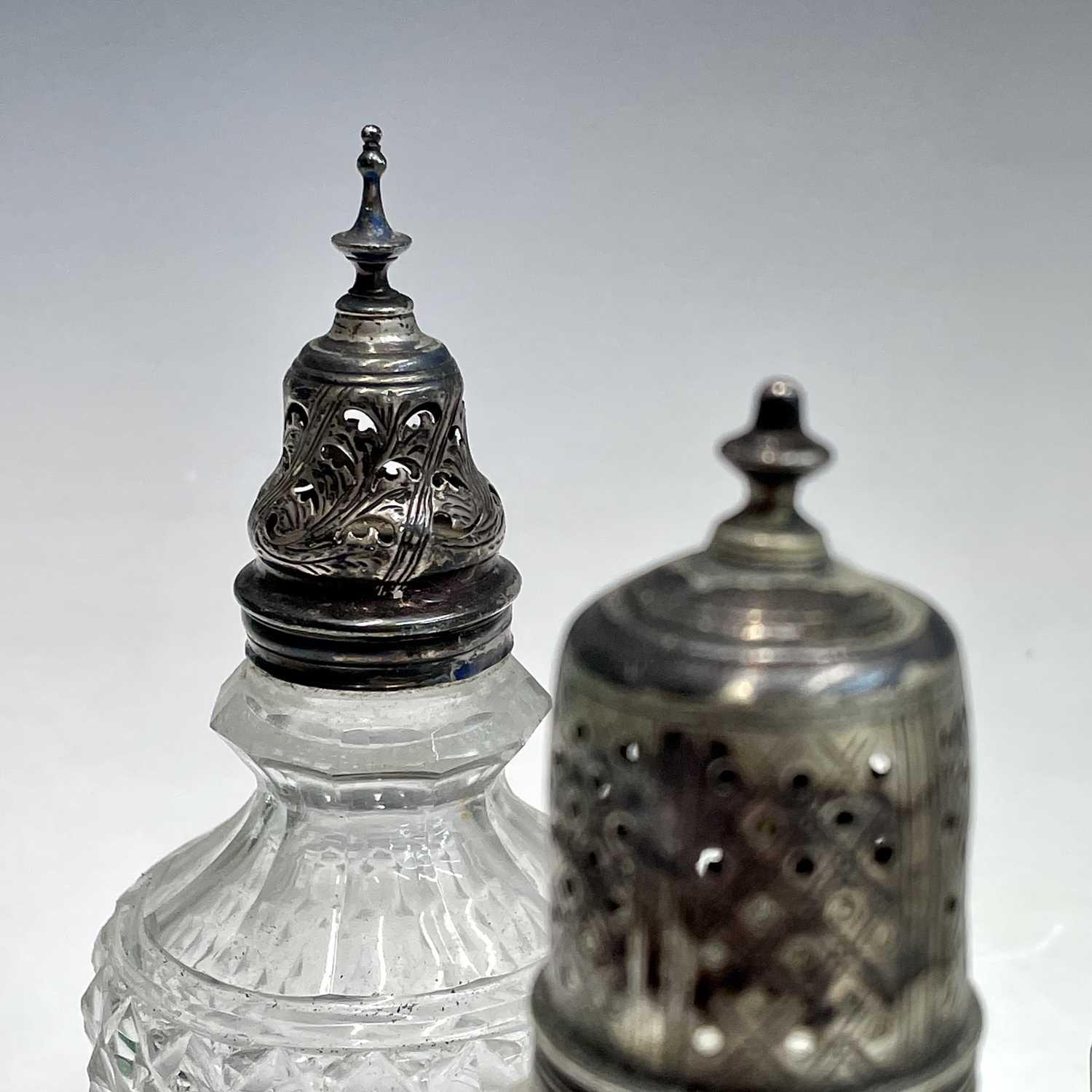 A collection of eight Georgian facet and cut glass cruet bottles with silver lids, all unmarked, the - Image 3 of 7