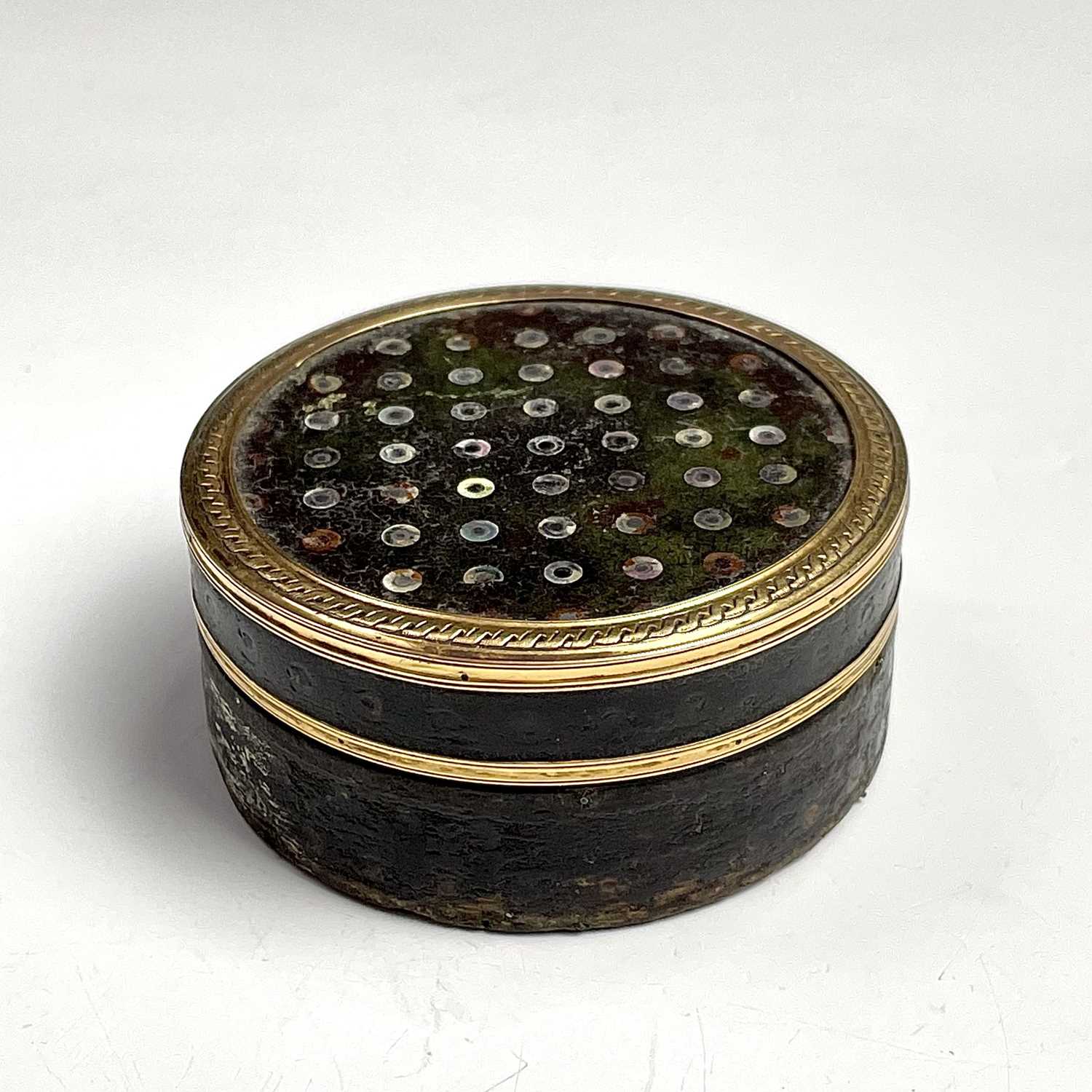 A 18th century French gold mounted mother of pearl dot inlaid circular section snuff box, diameter - Image 7 of 7