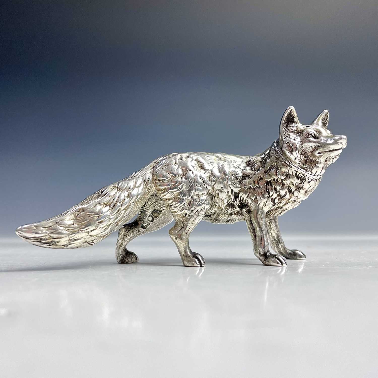 A good Victorian heavy silver pepperette modelled as a fox by William Hurcomb, London 1896, length