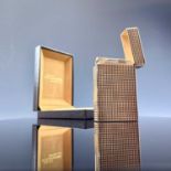 A rose gold plated S. T. Dupond Paris lighter, within original box.