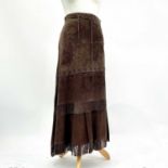 Chine Collection, a brown suede leather long skirt with fringes, size small.
