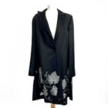 Alexander McQueen, a black mixed cotton long coat with silver fruiting grape vine detail, size 44.