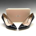 Miu Miu, a pair of Capra Pump patent leather shoes, size 37.5.