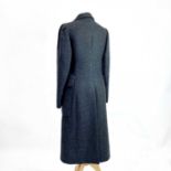 Prada, a grey wool long coat, size 42.Condition report: This has generally been well worn with