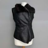 A Marc Cain faux leather and fur waistcoat, size 8-12.