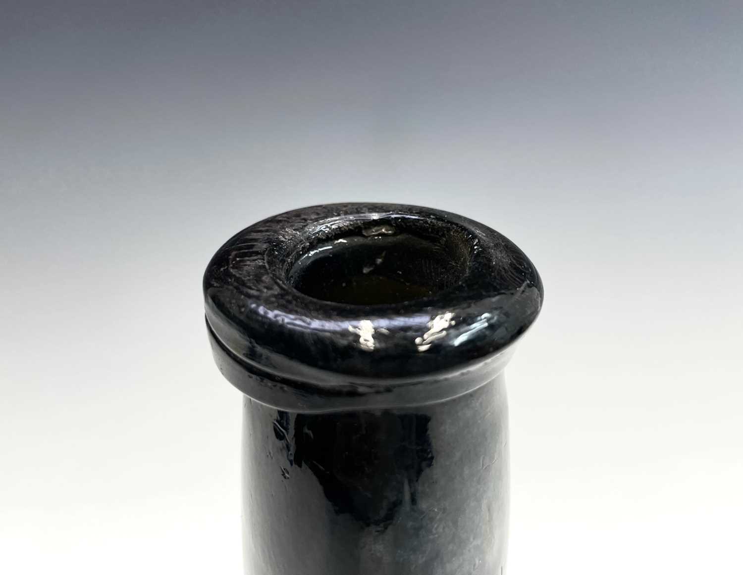 A mid 18th century sealed wine bottle, thick olive green, with kick-in base, the seal with a crown - Image 3 of 3