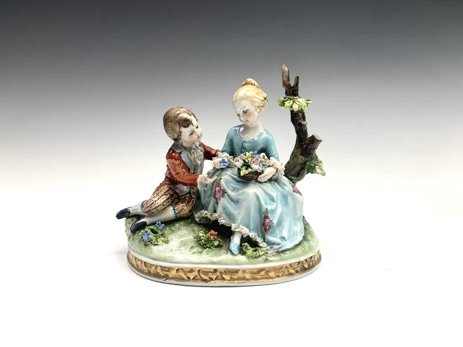 A German porcelain oil lamp base, circa 1900, modelled as a basket supported by three cherubs, - Image 5 of 10