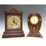 A German oak cased mantel clock, early 20th century, the movement by Winterhalder and Hoffmeier,