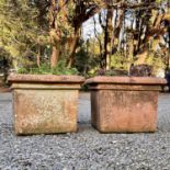 A pair of terracotta square planters, height 41cm 53cm square.
