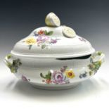 A Meissen porcelain tureen and cover, mid 18th century, with sliced lemon finial and moulded