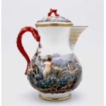 A Meissen coffee pot and cover, moulded in relief in the Capodimonte style with figures cavorting in