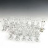 A set of Seven Edwardian cut glass wines, with oval cut panels, together with other Victorian and
