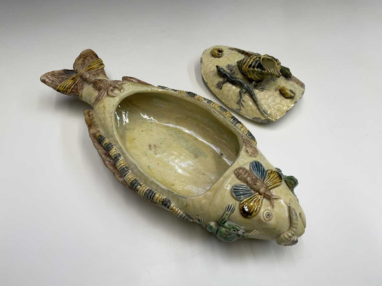 A Portuguese Pallisy style fish shaped tureen and cover, circa 1900, with applied shells, lizards, - Image 5 of 12