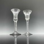A pan top wine glass, circa 1760, on a double spiral air twist stem, height 15.4cm, together with