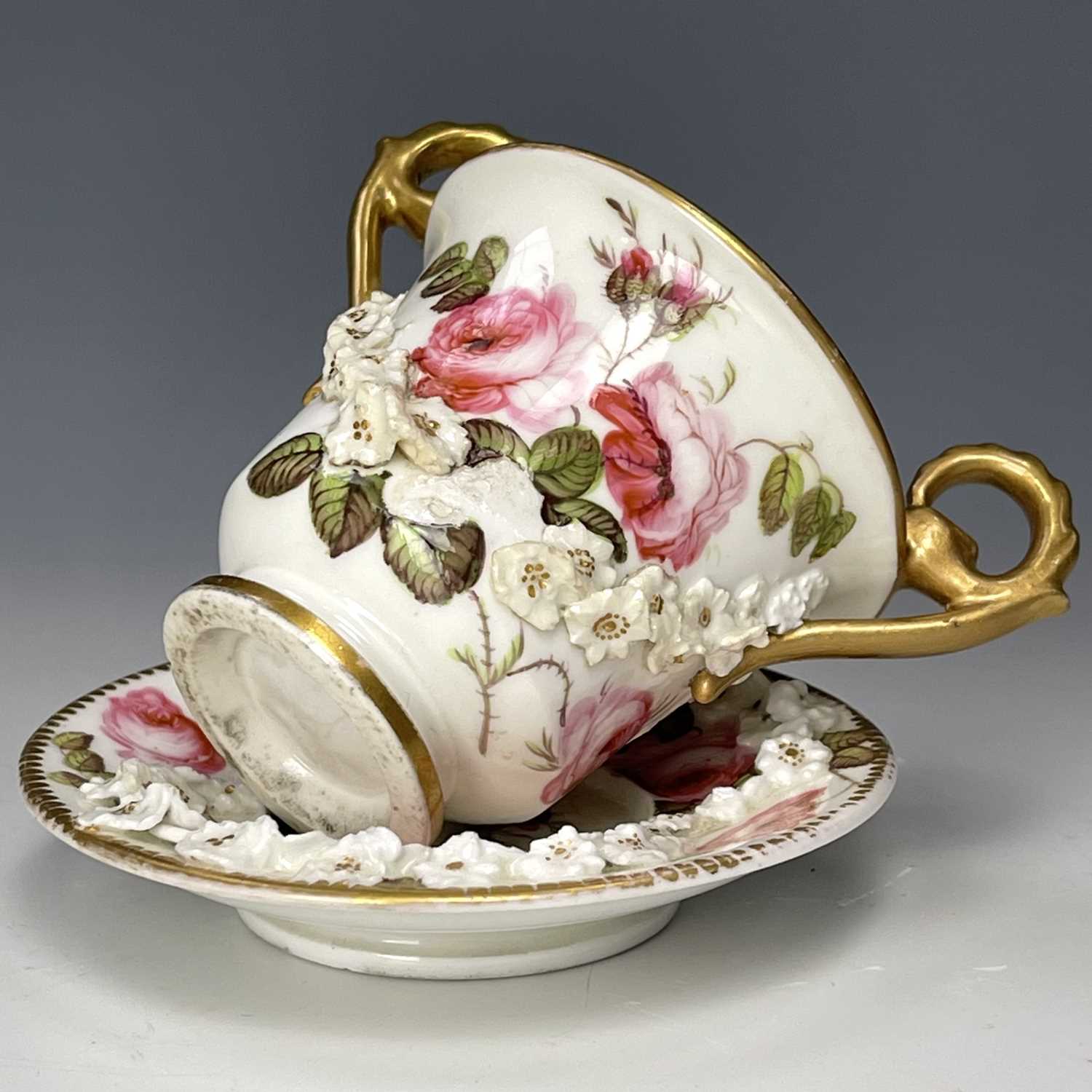 A Nantgarw miniature cabinet cup and saucer with double gryphon handles, applied floral decoration - Image 3 of 10