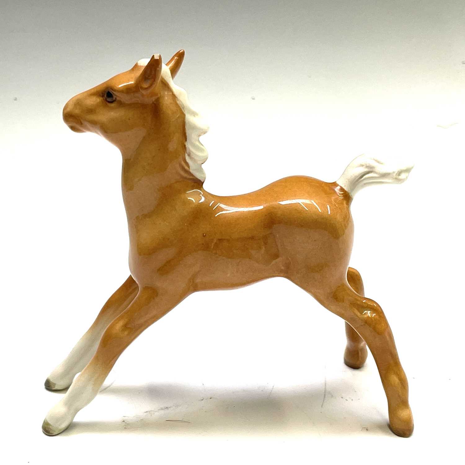 A Beswick pottery cantering shire horse, together with a shire horse with a yellow braid, and a - Image 13 of 15