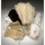 A late 19th century ostrich feather hand fan, a velvet coal scuttle hat circa 1930, vintage