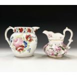 A Swansea documentary creamware jug painted with floral decoration and inscribed 'Eliz'th Thomas,