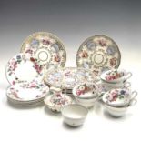 A Floral decorated tea set, circa 1920, retailed by St. Patricks, Broadway, Worcestershire,