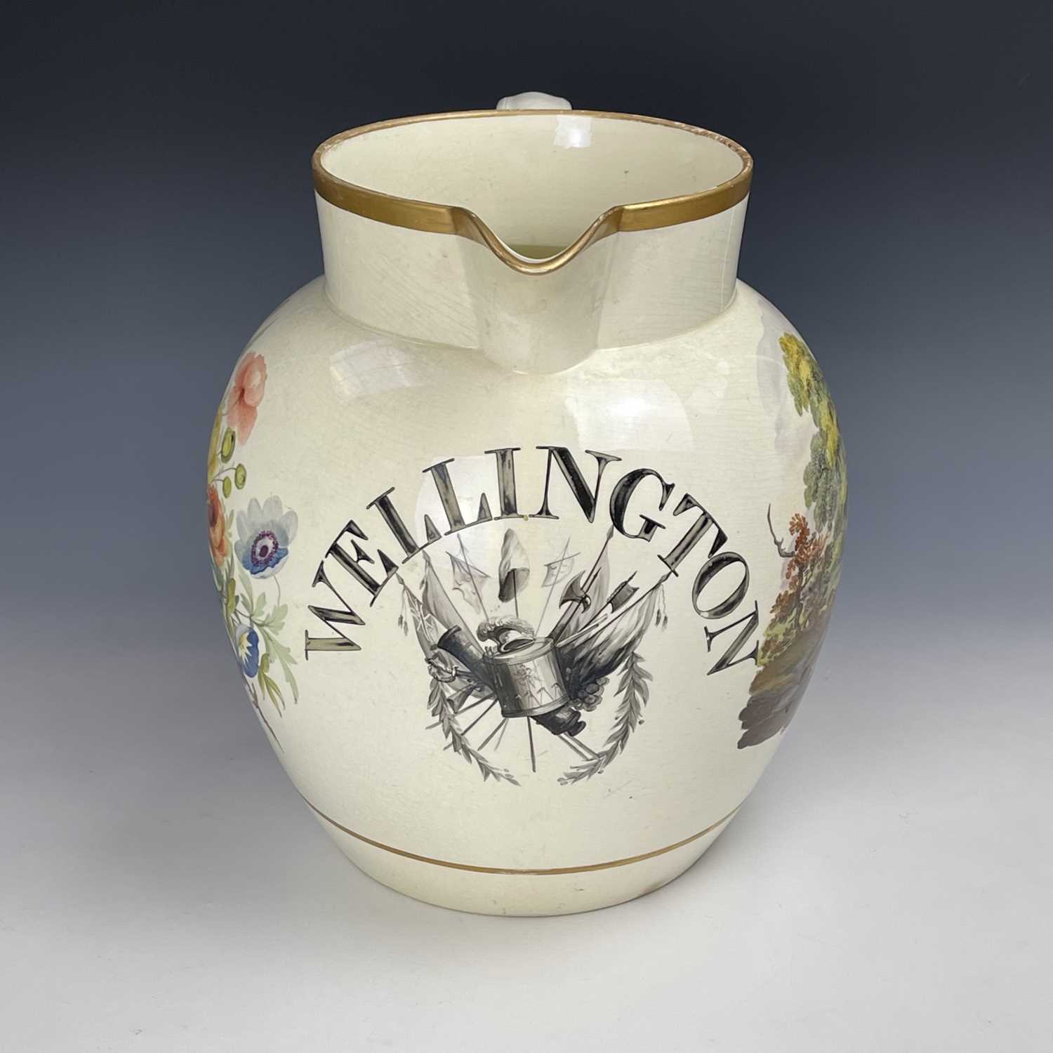 An exceptionally large creamware presentation jug, circa 1820, highlighted in gilt painted in - Image 2 of 8