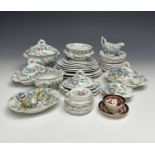 An extensive Victorian doll's earthenware dinner service, transfer printed with flowers and