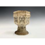 An artificial stone miniature Gothic font, in the style of Coade, probably 19th century, the