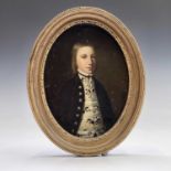 British School, early 19th century Portrait of a young man in a floral waistcoat Oil on tin, oval,