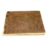 An artist's sketchbook, circa 1930s, containing watercolour landscapes, seascapes and including a