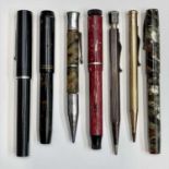 A Watermans fountain pen, three others, a silver Yard-o-led pencil and two others (7).