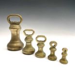 A set of five Victorian brass bell weights.Provenance: Alan Bennett (1930-2021) was an enormously