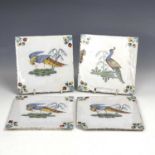 Four good Liverpool polychrome Delft tiles, painted with birds in Fazackerly colours, 13cm, x 13cm.