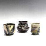 A Japanese studio pottery small vase, with mottled glazes, impressed seal mark, height 9.5cm,