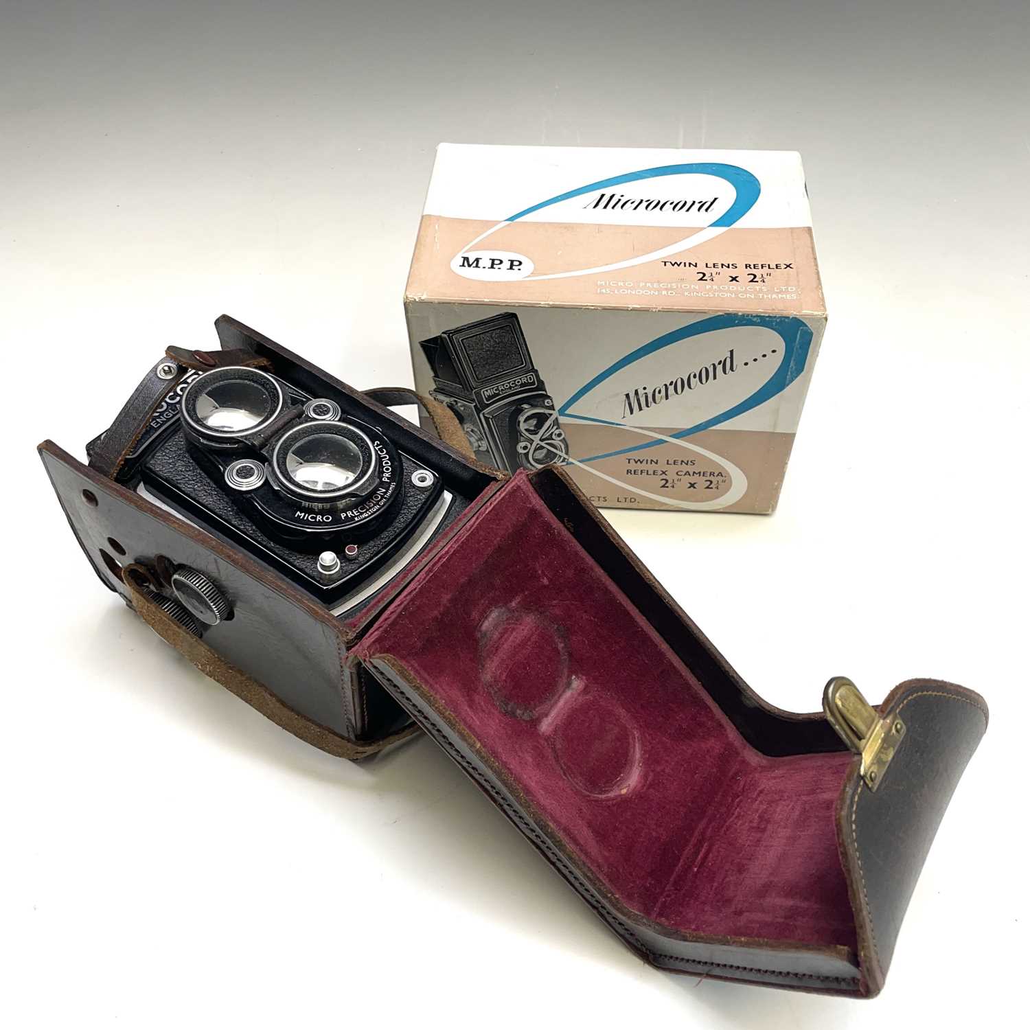 Microcord Twin Reflex camera in leather case with original box.Condition report: The shutter is in