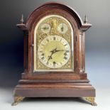 A German Winterhalder & Hoffmeier chiming bracket clock, circa 1900, with domed walnut case, the
