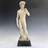 A composite marble statue of Michelangelo's David on a marble base by G Ruggeri signed, height