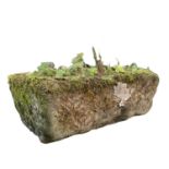 A granite rectangular trough height 23cm length 71cm depth 43cm.