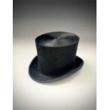A Gieves silk plush 'moleskin' top hat with original box.Condition report: The inner circumference