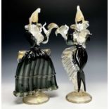 A Pair La Serenissima Murano art glass figures of Venetian dancers with black and gilt decoration,