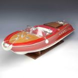 A well made Riva Aquarama model speedboat with remote control and accessories including fitted