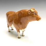 Three Beswick models of Guernsey cattle, comprising a bull, 'CH. Sabrina's Sir Richmond 14th', a