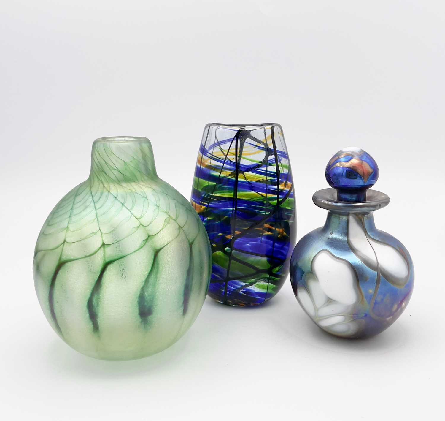 Norman Stuart CLARKE (b.1944)An iridescent art glass perfume bottle with stopper Signed & dated (