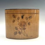 A George III oval satinwood tea caddy, with floral and trailing foliate inlay and lidded