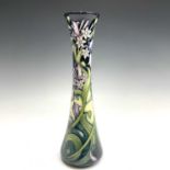 A Moorcroft Isis pattern vase, of tall waisted slender form, designed by Emma Bossons, dated 2003,