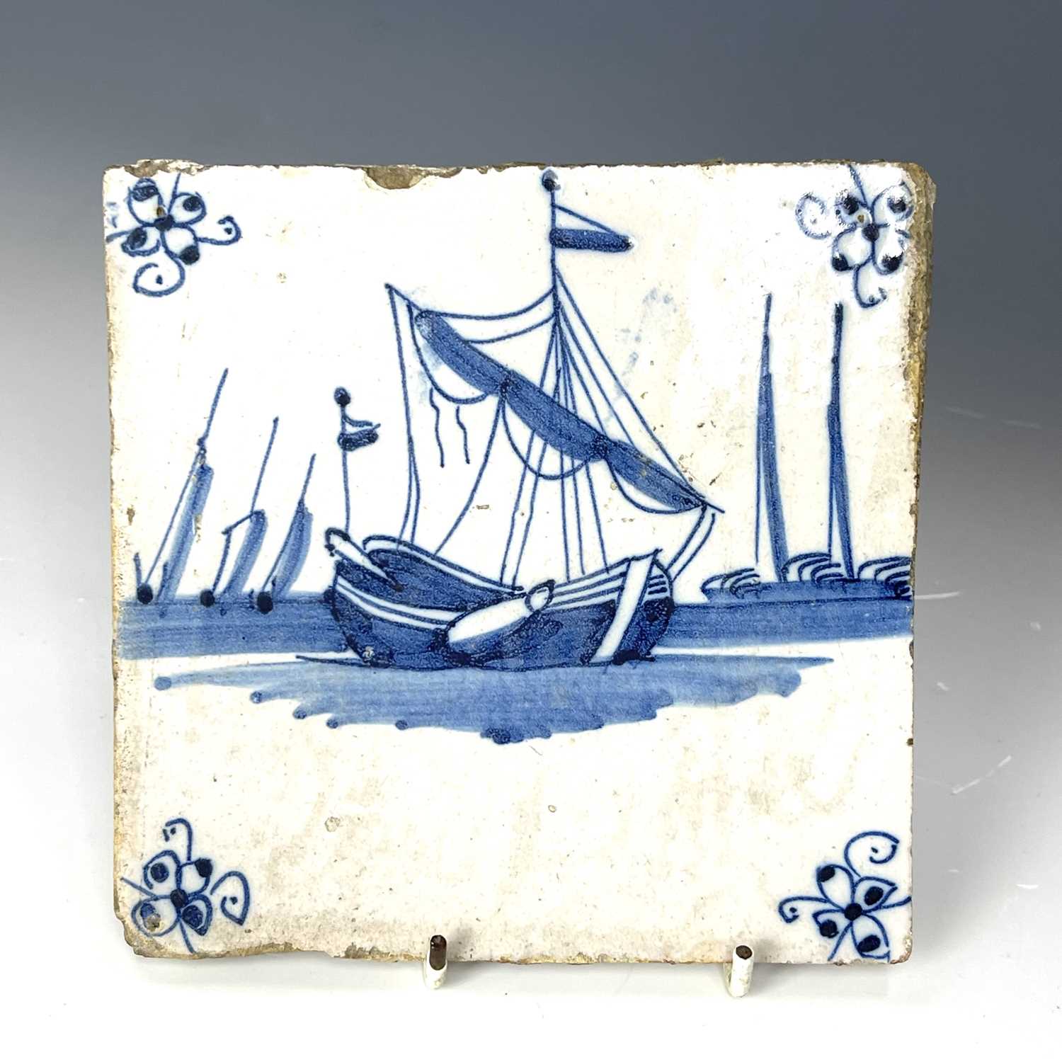Four blue and white Dutch Delft tiles, decorated with various scenes including a flute playing - Image 3 of 11