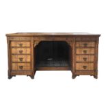 A Victorian Gothic revival oak ebony and boxwood inlaid twin pedestal desk or dressing table, in the