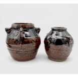 Sylvia HARDAKER for St Ives Pottery, two tenmoko glazed vases, each with four lug handles, impressed