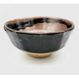 Bernard Howell LEACH (1887-1979) A St Ives Pottery stoneware bowl by Bernard Leach with cut sides