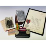 Penzance, Cornwall Interest. Lot comprises a framed and glazed silver Imperial Service Medal with