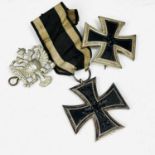 Germany - Iron Crosses (x2). Lot comprises First World War Iron Cross complete with ribbon, a